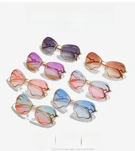 Collection de lunettes de soleil sans monture à vagues avec verres dégradés