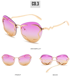 Lunettes de soleil sans monture en forme de nuage avec dégradé rose et branches dorées