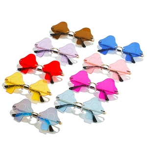 Fashionable rimless mushroom shaped sunglasses for women in eight assorted vibrant colors