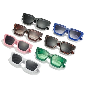 Set of trendy oversized square sunglasses in seven vibrant colors on a white background