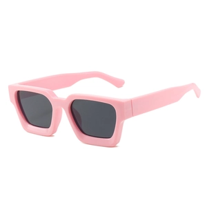 Pink oversized square frame sunglasses with dark lenses shown in a stylish side view angle