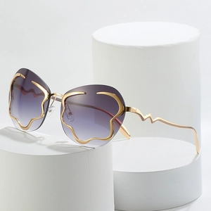 Lunettes de soleil nuage sans monture avec verres dégradés violets et bords dorés