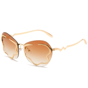 Lunettes de soleil sans monture à bords ondulés dorés avec verres dégradés marron
