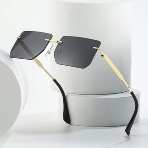 Rimless square sunglasses with grey gradient lenses and gold textured metal temples