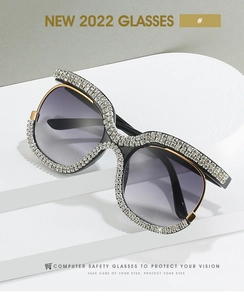 Detail view of fashion sunglasses featuring oversized frames and sparkling rhinestones