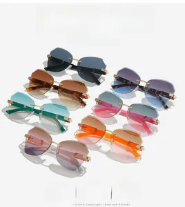 Collection of seven frameless geometric sunglasses in various gradient fashion colors
