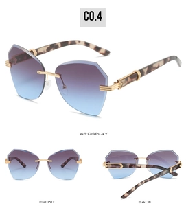 Detail views of rimless butterfly sunglasses with purple-blue gradient lenses and tortoise legs