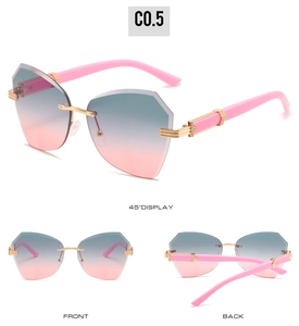 Frameless rimless sunglasses featuring gradient pink-to-blue lenses and pink metal temples