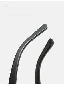 Detail view of glossy black rimless sunglasses curved temple legs for comfortable fit