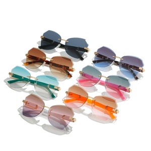 Frameless geometric sunglasses for women with gold metal temples in seven gradient colors
