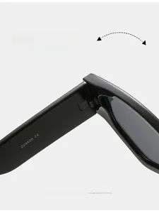 Macro detail of high-quality hinges and CE certification on black cat eye sunglasses