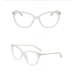Detail view of transparent white TR90 cat eye glasses with light gold metal temples