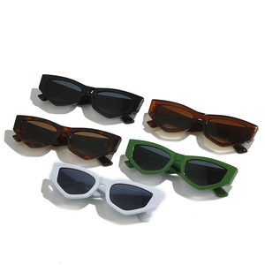 Chic cat eye sunglasses set in black, white, green, and tortoiseshell for women