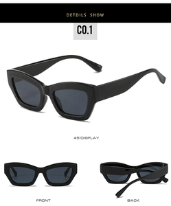 Macro view of retro square black sunglasses with wide temples and dark grey lenses