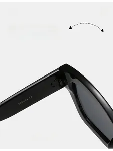 Macro view of sturdy metal hinges and CE certification on black square sunglasses