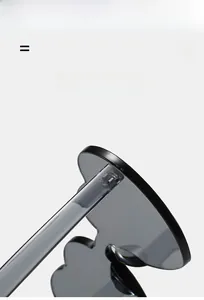 Detail view of lightweight grey heart sunglasses frame hinge and flexible temple joints