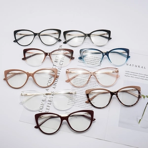 TR90 cat-eye blue light glasses frames in various colors shown on a magazine background