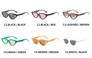 Grid view of vintage cat-eye sunglasses in black, leopard, and green plastic frames