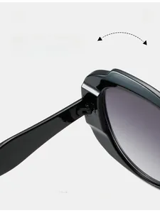 Detail of durable texture hinge on black diamond sunglasses with gradient lenses