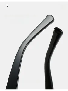 Macro detail of ergonomic black glossy sunglasses arm with arc comfortable wear design