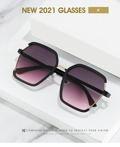 Detail of metal dual-tone frame sunglasses with purple gradient lenses on marble