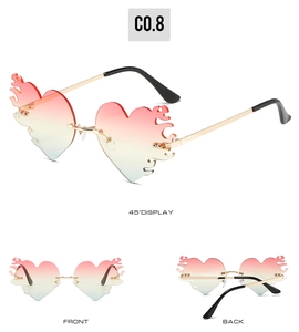 Detaillierte Mehrwinkelansicht der randlosen herzförmigen Flammen-Sonnenbrille mit Pinkverlauf