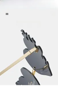 Makro-Detail der goldenen Metallscharniere und Nasenpads der Flammen-Sonnenbrille