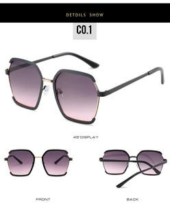 Detail view of geometric metal sunglasses with dual-tone frame and gradient lenses
