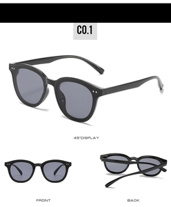 Three-angle display of black cat-eye sunglasses with dark lenses and metal accents