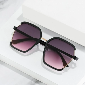 Women's oversize geometric sunglasses with black gold metal frame and purple gradient lenses