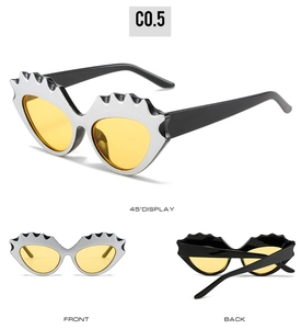 Vues détaillées des lunettes de soleil œil-de-chat ondulées argentées aux verres jaunes