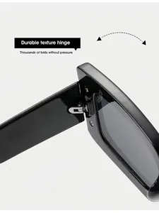 Detailaufnahme der quadratischen Sonnenbrille mit robustem Metallscharnier und Glanz-Finish