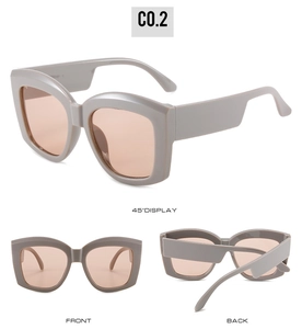 Detailed multi-angle views of grey oversized sunglasses with tinted brown lenses