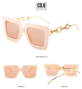 Three-way view of square sunglasses with pink frames and golden chain temples