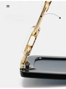 Close-up of durable golden metal chain temples and hinge on black square sunglasses