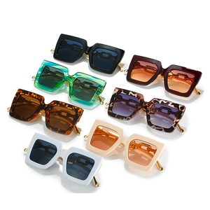 Modern square chunky sunglasses with gold chain temples in multiple trendy colors
