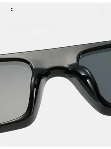 Detail of ergonomic nose pads on rectangle sunglasses for long-term comfort