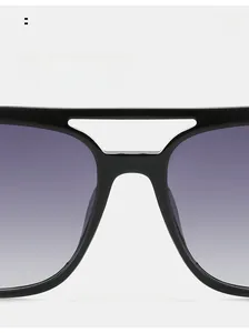 Detail of integrated nose pads on black double-bridge sunglasses for comfortable wear
