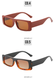 Detailed 45-degree angle display of rectangular vintage sunglasses in red and tortoiseshell