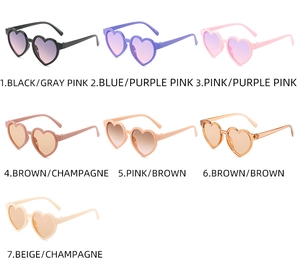 Detailed grid of heart-shaped kids sunglasses in seven assorted candy colors and lens tints