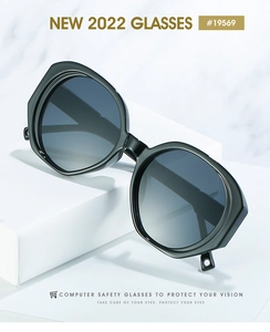 Detail of modern oval diamond sunglasses with black frames and grey gradient lenses