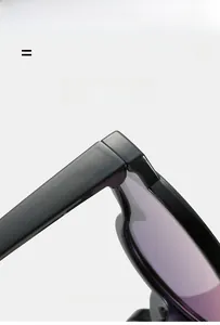 Detail of super elastic hinge and gradient purple lenses on black kids sunglasses
