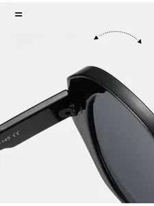 Detail shot of durable texture hinges on black oval sunglasses with CE marking