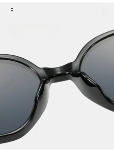 Detail of ergonomic comfortable nose pads on black oval sunglasses for a pressure-free fit