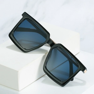 Fashion oversized square sunglasses with black glossy frames and blue tinted lenses