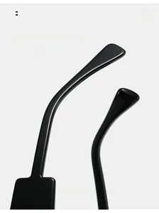 Detail of curved black glossy sunglasses legs featuring ergonomic arc for comfortable wear