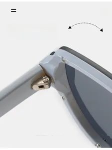 Gros plan sur les charnières en métal durable des lunettes de soleil gris oversize