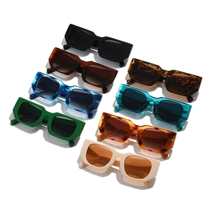 Set of eight retro thick-frame rectangular sunglasses in various vibrant colors on white