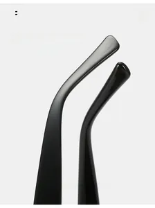 Detail of ergonomic curved glossy black sunglasses temples with mirror-like finish