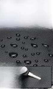 Detail view of lychee pattern leather showing waterproof and scratch resistant properties
